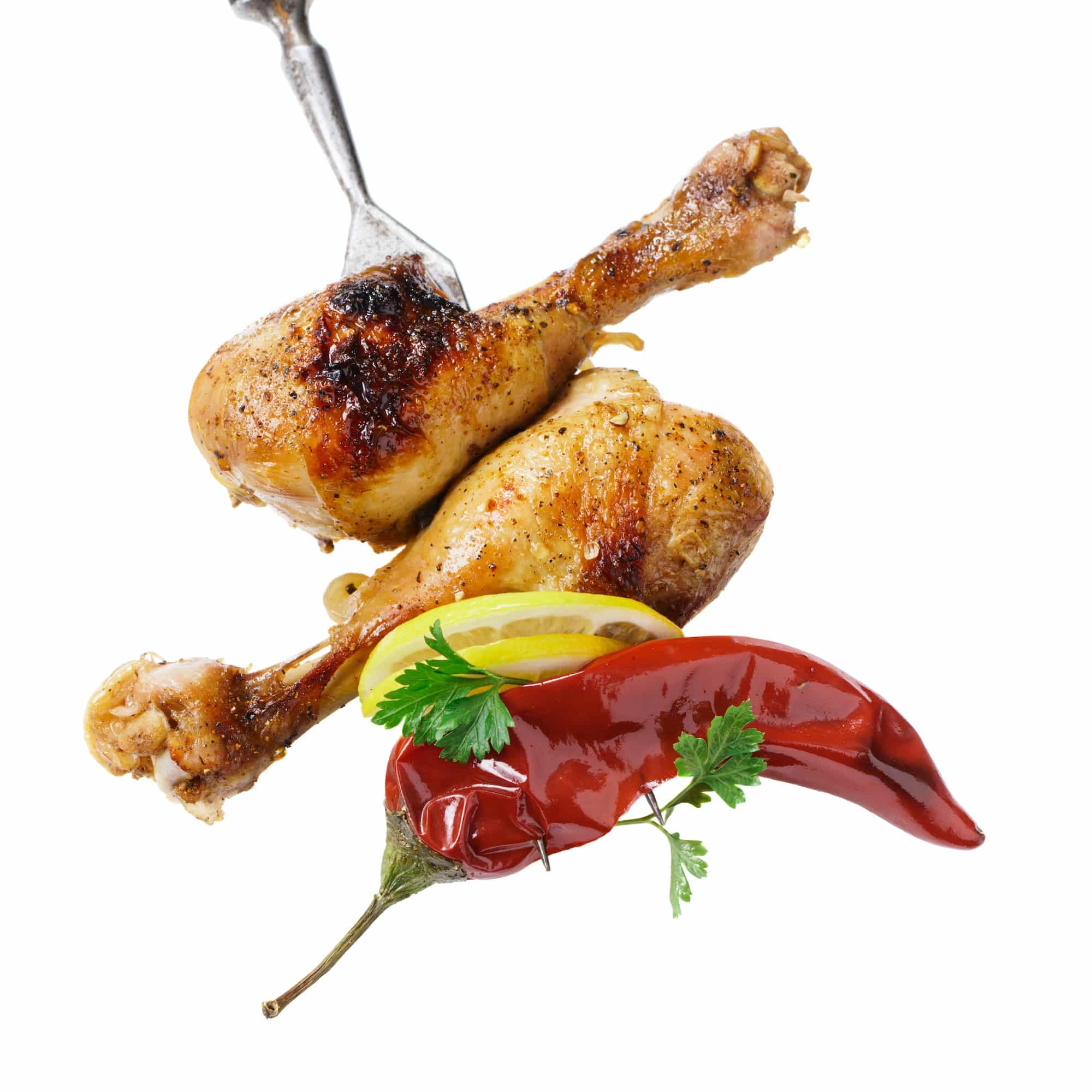 Grilled chicken drumsticks isolated